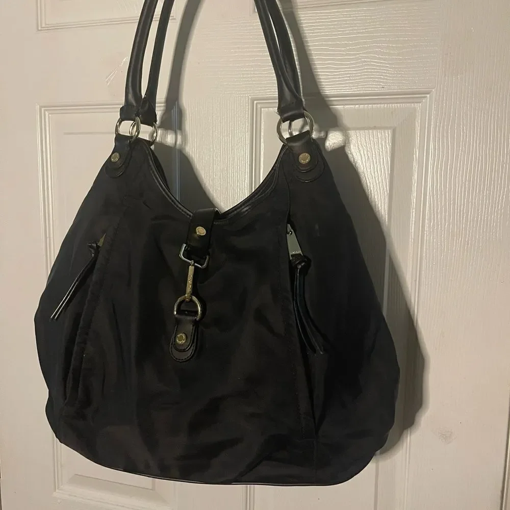 Calvin Klein Black Nylon large shoulder bag with gold tone hardwares.